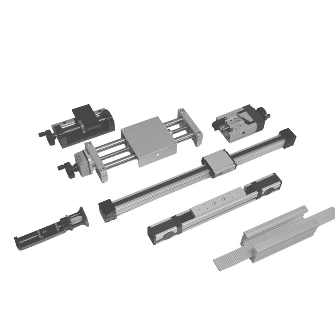 Collection of various linear motion system components including rails, carriages, and actuators.